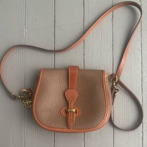 Elegant Brown Dooney & Bourke All Weather Leather Crossbody Bag
